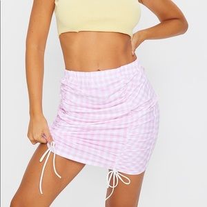 PRETTY LITTLE THING PinkGingham Ruched Mini Skirt